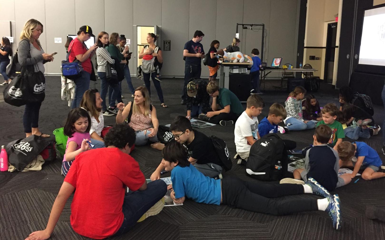 Hundreds of kids try out drones at GIS Day event (THIS ONE)